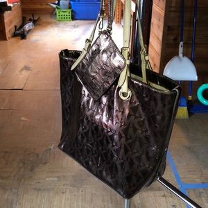 Michael Kors handbag and matching wristlet.